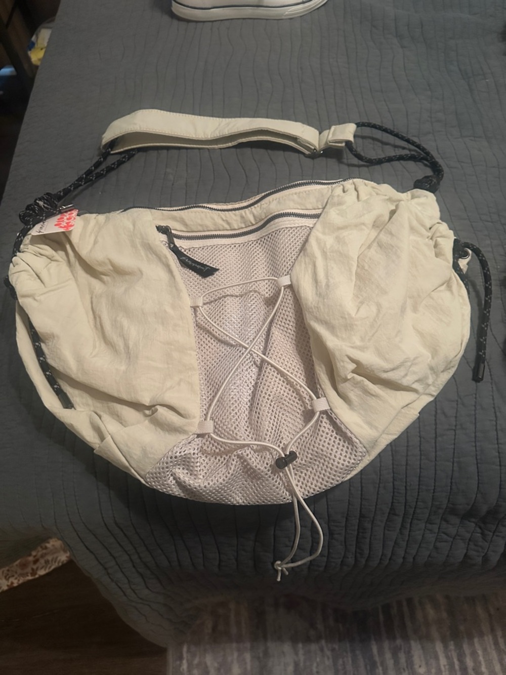 Free People Light Cream Drawstring Shoulder Bag with Black Accents